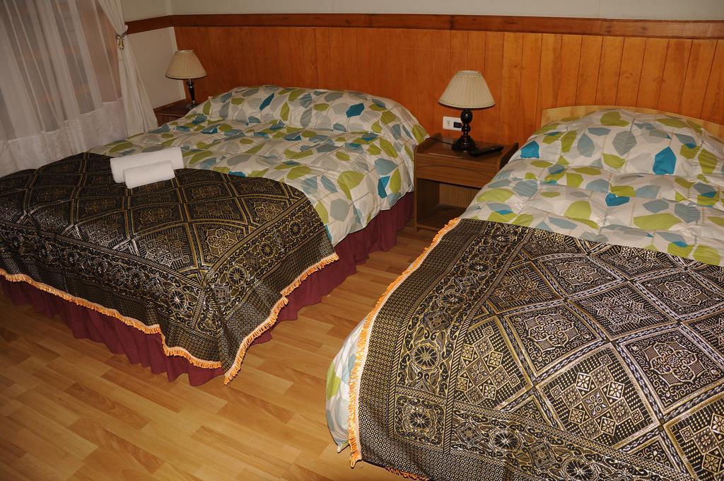Hostal El Rincon بويرتو ناتالز الغرفة الصورة